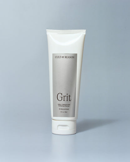 Image of Cult of Reason skincare product Grit, a sulfur and salicylic acid based facial scrub, on a light blue background